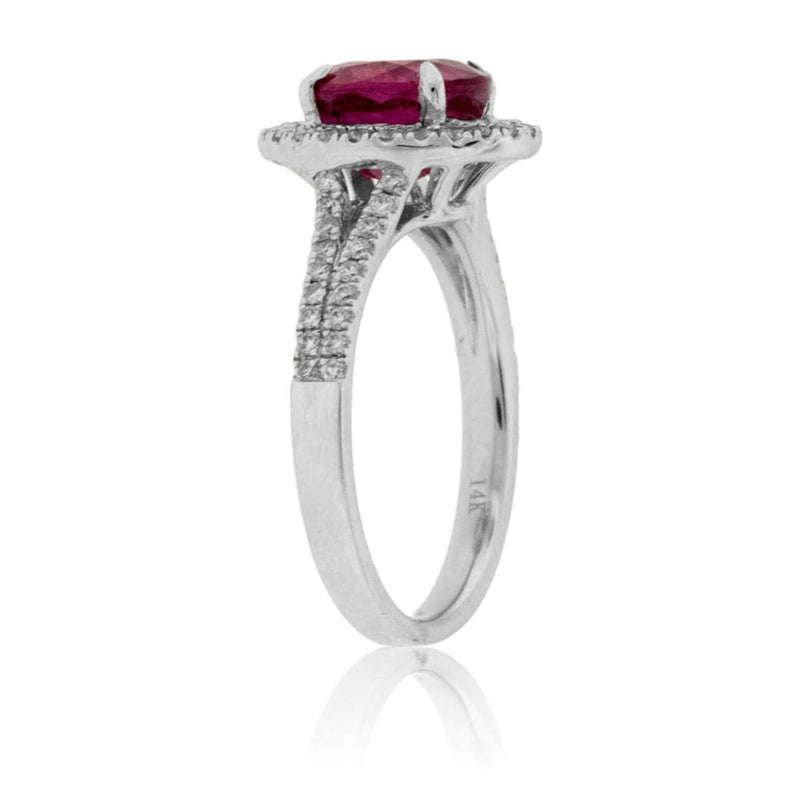 Oval Ruby and Split Shank Diamond Halo Ring - Park City Jewelers