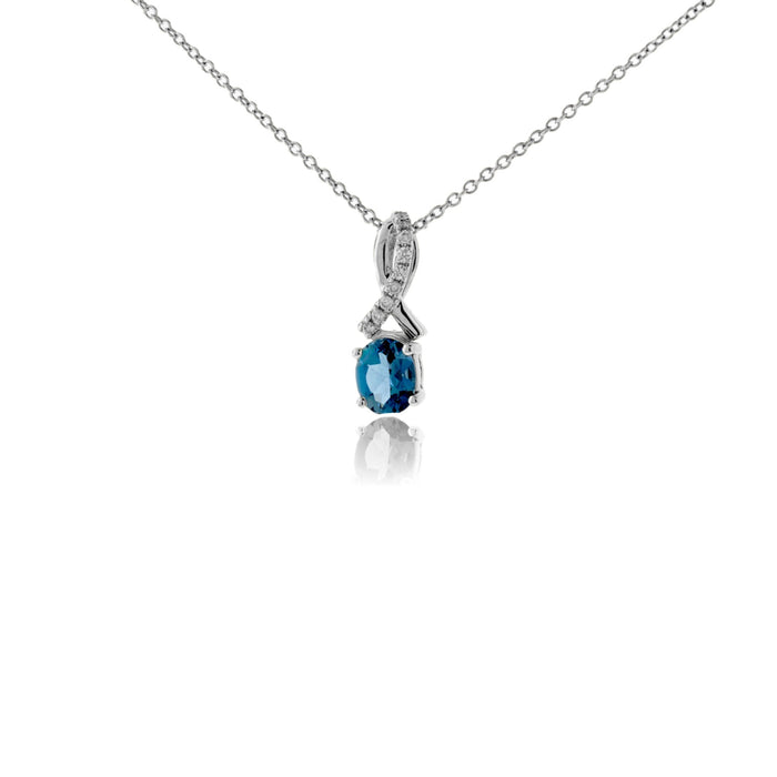 Oval Shaped Aquamarine & Diamond Halo Pendant - Park City Jewelers