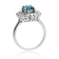 Oval Shaped Blue Zircon with Baguette Burst Diamond Halo - Park City Jewelers