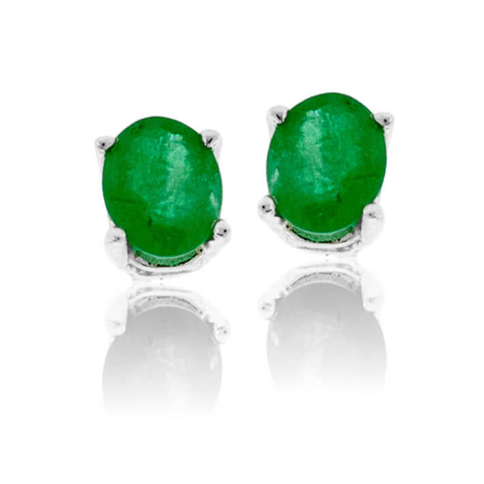 Oval Shaped Emerald White Gold Stud Earrings - Park City Jewelers