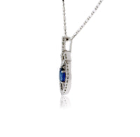 Oval Shaped Sapphire with Diamond Outline Pendant - Park City Jewelers