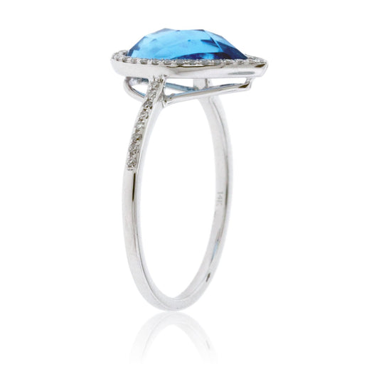 Pear Shaped Blue Topaz and Diamond Halo Ring - Park City Jewelers