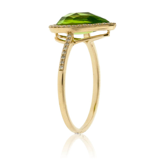 Pear Shaped Peridot with Diamond Halo on Diamond Accented Band - Park City Jewelers