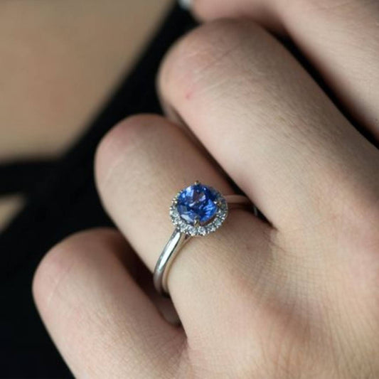Round Tanzanite and Diamond Halo Ring - Park City Jewelers