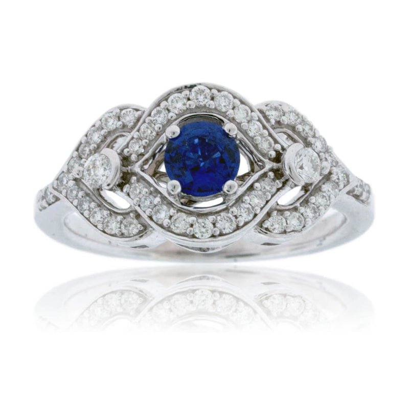 Sapphire Centered Diamond Accented Engagement Ring - Park City Jewelers