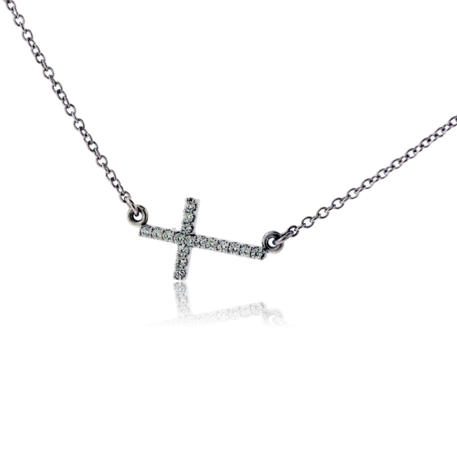 Zancan silver necklace with cross pendant and black stones.
