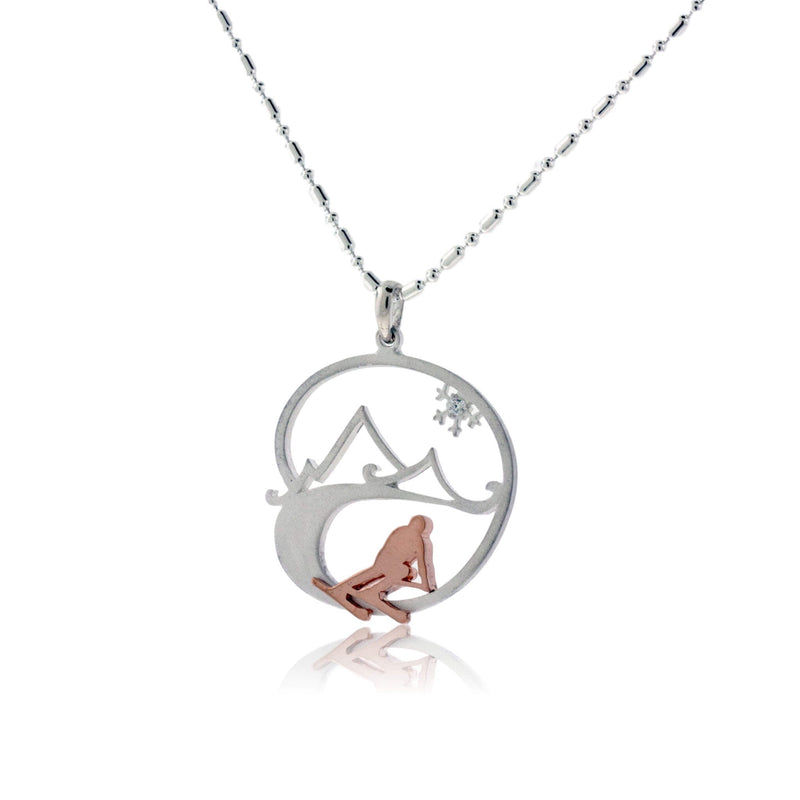 Skier in the Mountains with Snowflake Pendant - Park City Jewelers