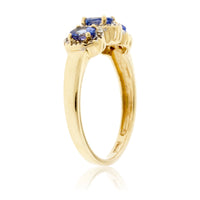 Three Stone Tanzanite with Diamond Halo Ring - Park City Jewelers