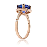 Trillion Tanzanite and Diamond Halo Ring in Rose Gold - Park City Jewelers